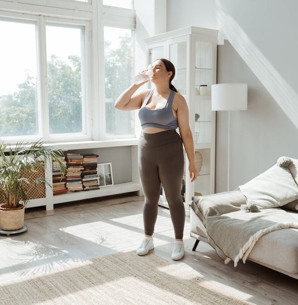 Clean minimalist interior with soft sunlight and workout gear